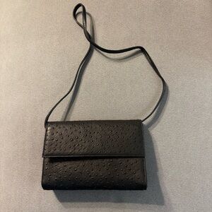 Chic Black Textured Clutch by due fratelli
